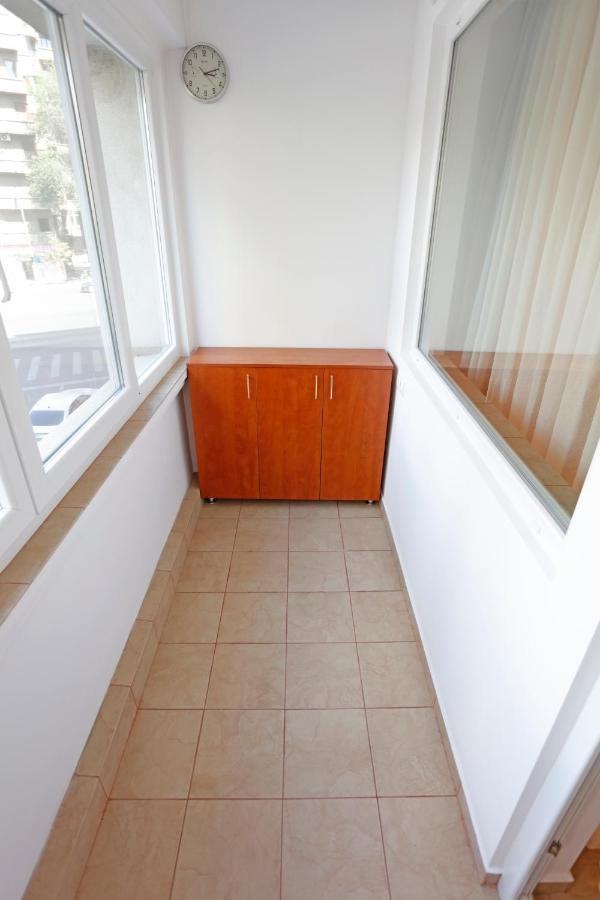 The enclosed balcony, with a cupboard