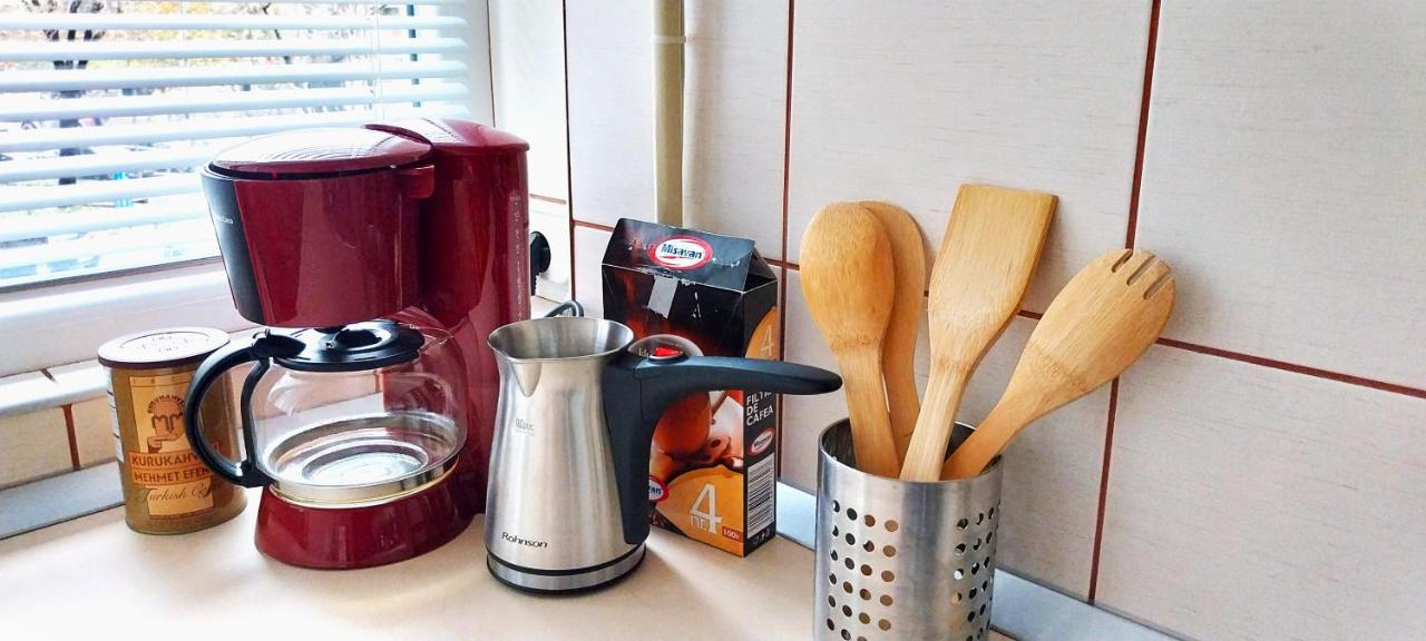 Coffee maker and electric kettle on the kitchen counter